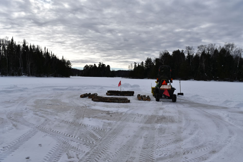Stu Whipple preparing to layout 1st log course